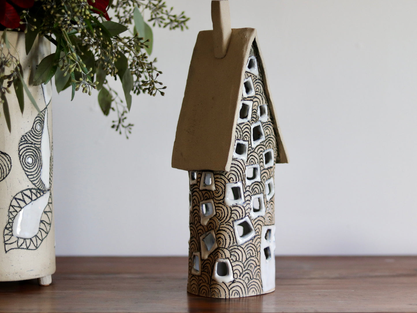 Lantern House - Tall with scale design and white windows