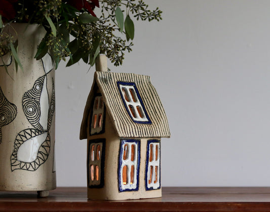 Lantern House - Tan with blue windows