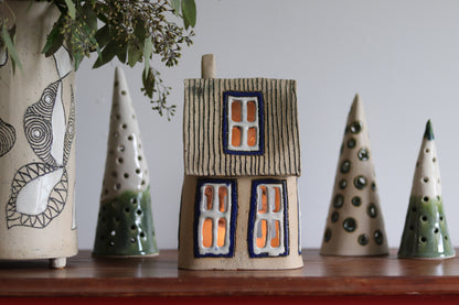 Lantern House - Tan with blue windows